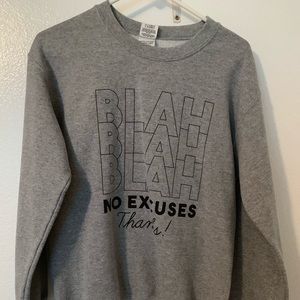 Grey sweatshirt with text
